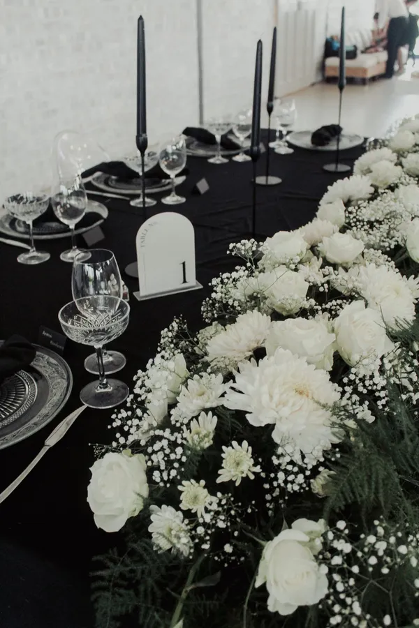 A black and white styled table setting.